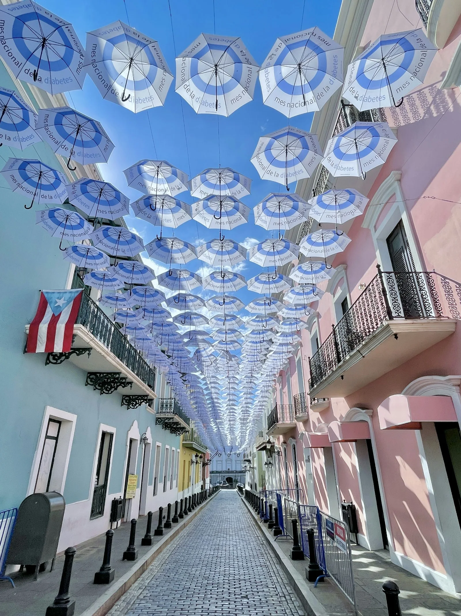 Umbrellas above a street in Old San Juan