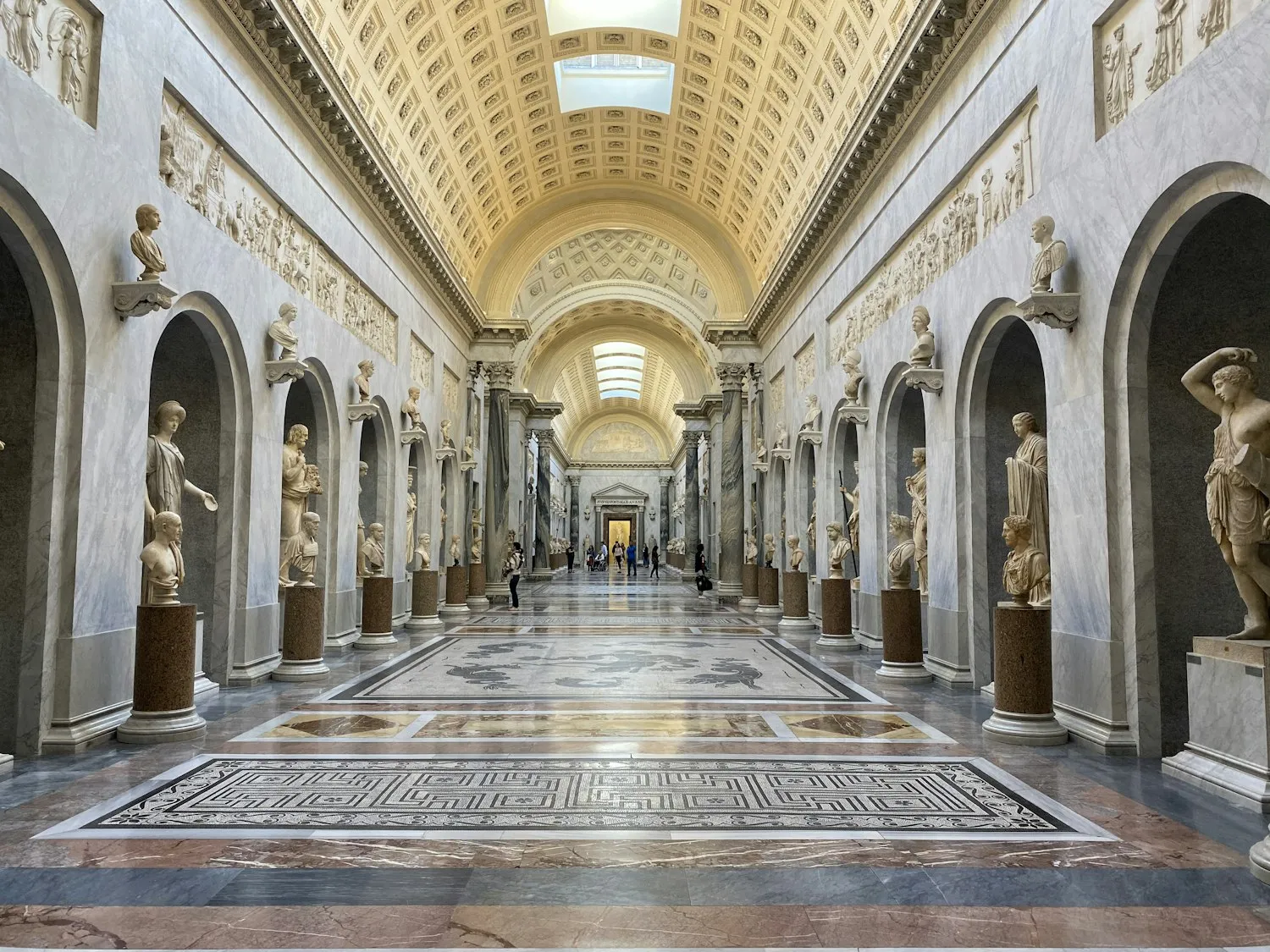 A sculpture-lined gallery in the Vatican Museums