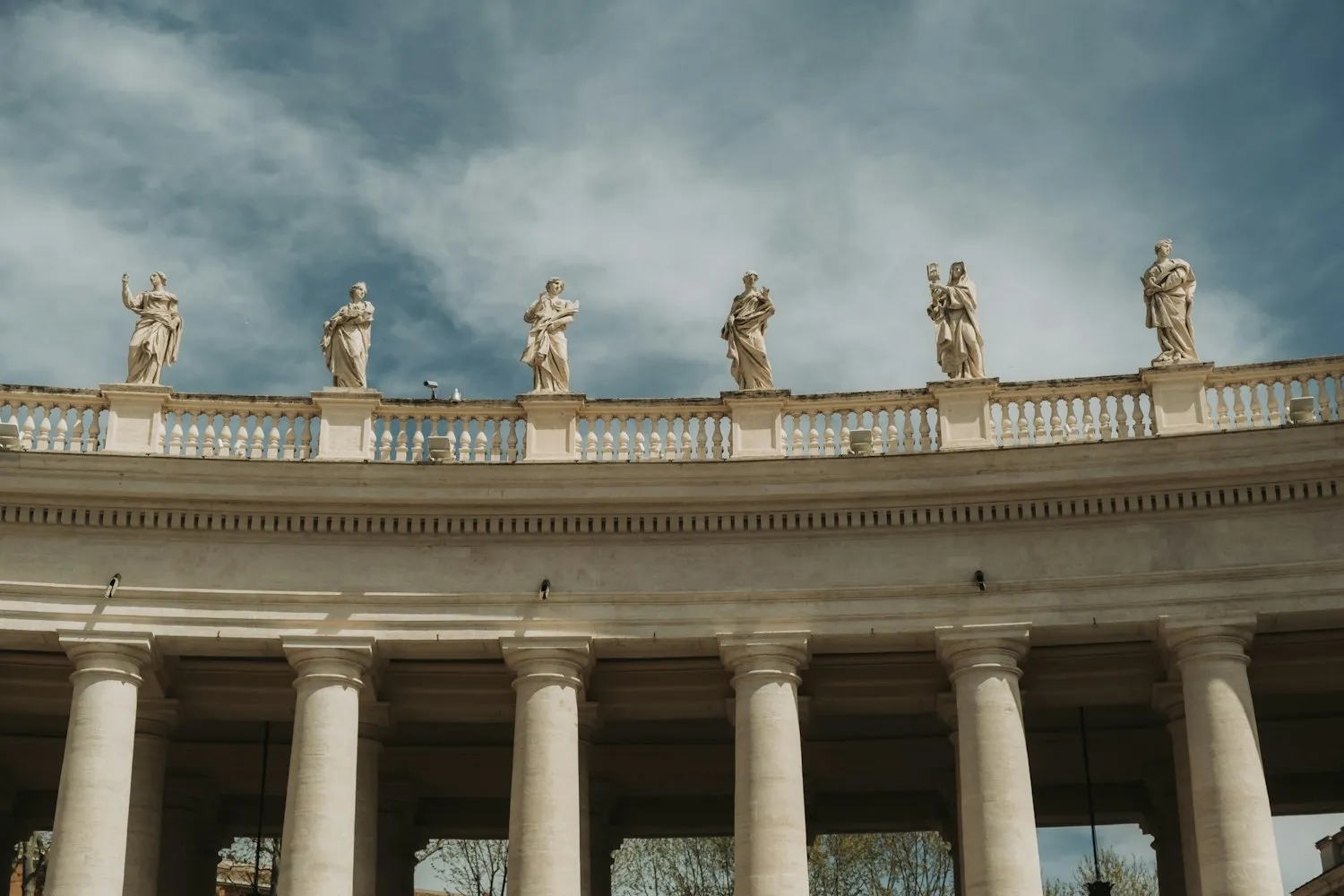 Statues above the colonnade