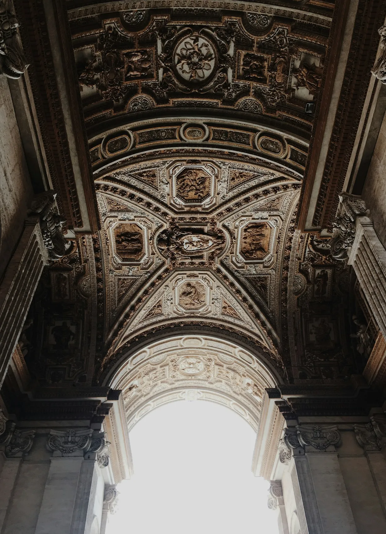 An ornate arch inside St. Peter’s Basilica