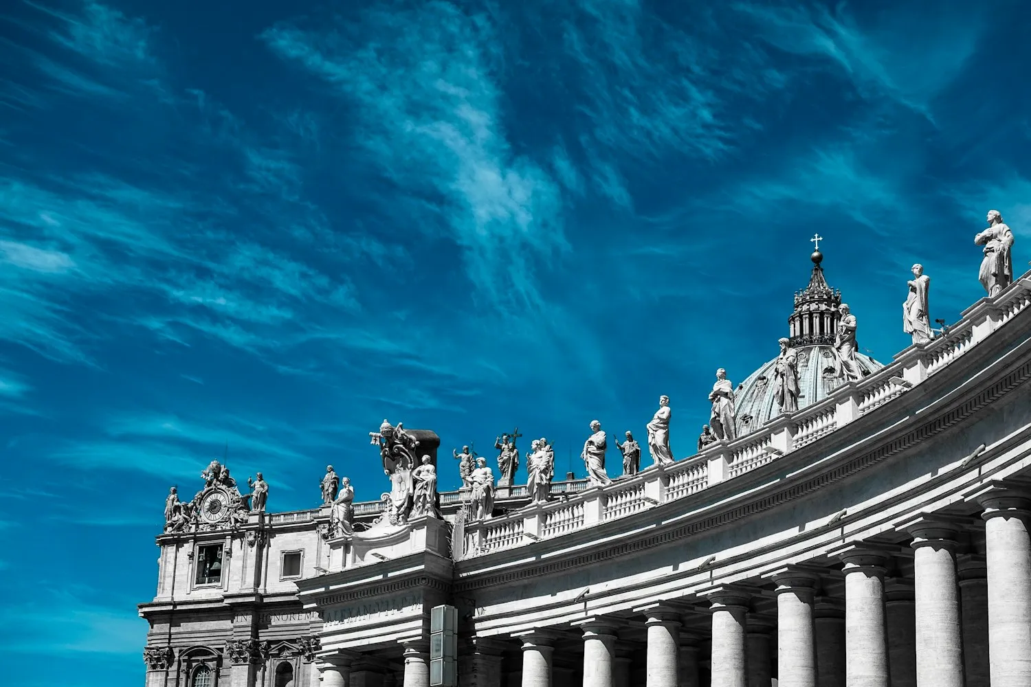 The colonnade against a darkening sky